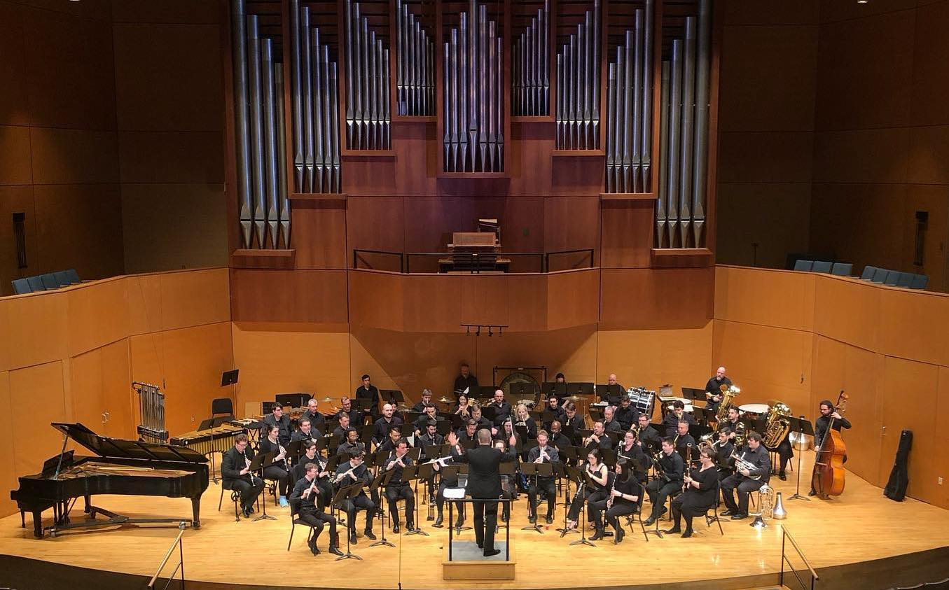 A picture of the Cleveland Winds in Waetjen Auditorium at Cleveland State University.